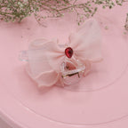Cream Bow Clutcher – Chic Fabric Design for Hair Styling