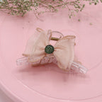 Cream Bow Clutcher – Chic Fabric Design for Hair Styling