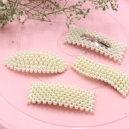 Set of 4 Random Pearl Hair Clips
