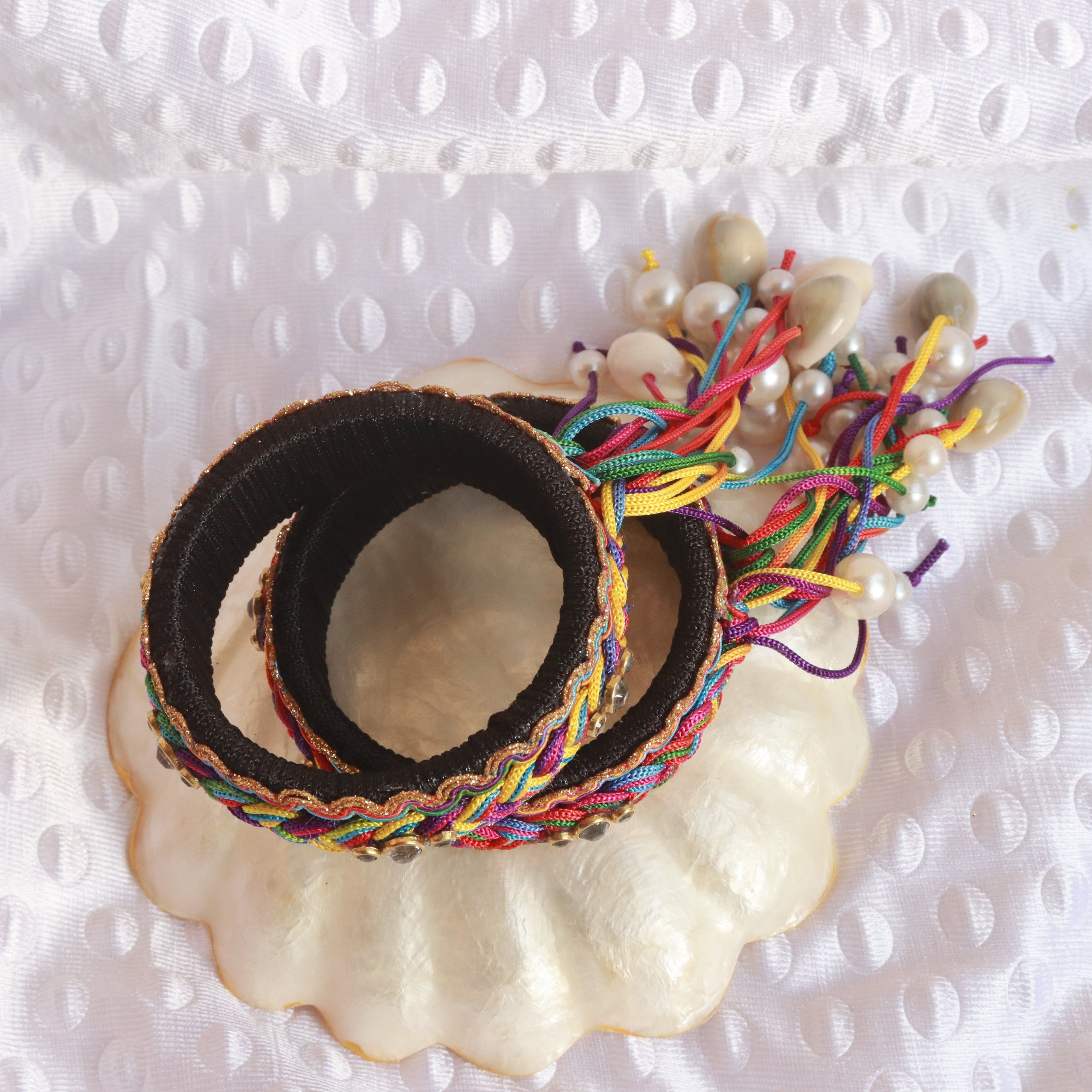 Bangles with hanging shells & pearls